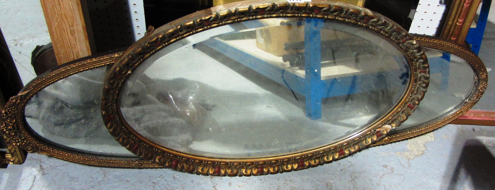 Appraisal: Two oval gilt mirrors