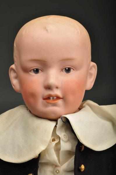 Appraisal: Gebruder Heubach Character Boy Description Well modeled bisque shoulder head