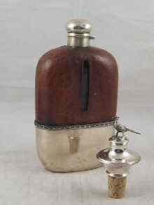 Appraisal: A large size sterling silver and pig skin spirit flask