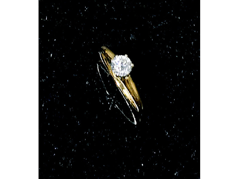 Appraisal: DIAMOND SOLITAIRE RING k yellow gold lady's ring set with