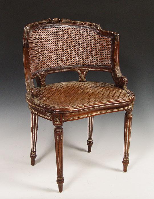 Appraisal: A PETITE LOUIS XVI STYLE CANED BARREL BACK CHAIR Natural