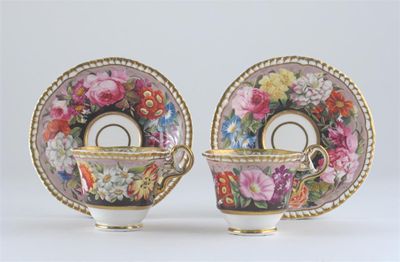 Appraisal: A pair of Spode cups and saucers richly painted with