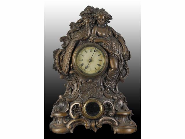 Appraisal: Iron Front Clock with Lady and Peacock Description Working Pendulum