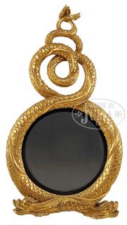 Appraisal: CARVED AND GILT DECORATED CONVEX MIRROR BY THE CARVERS' GUILD