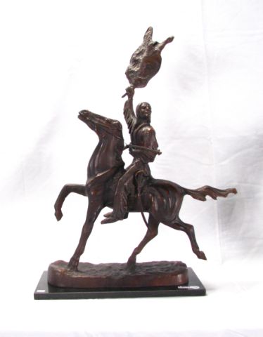 Appraisal: Remington Bronzed cast metal reproduction sculpture depicting Indian Warrior on