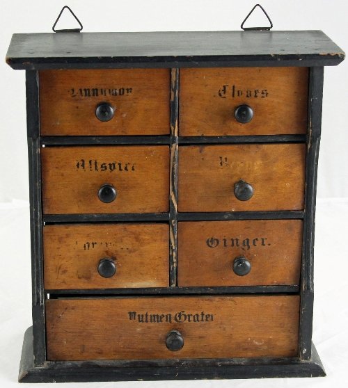 Appraisal: A painted pine spice box with seven named drawers cm