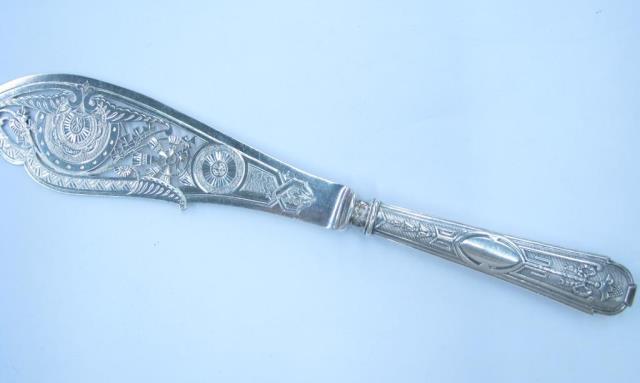 Appraisal: Antique ornate English silver plate fish knife with embossed reticulated