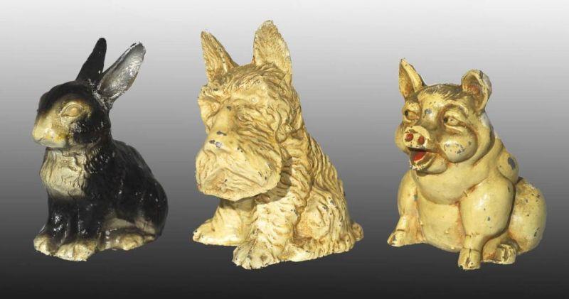 Appraisal: Lot of Metal Still Banks Description Includes rabbit pig and