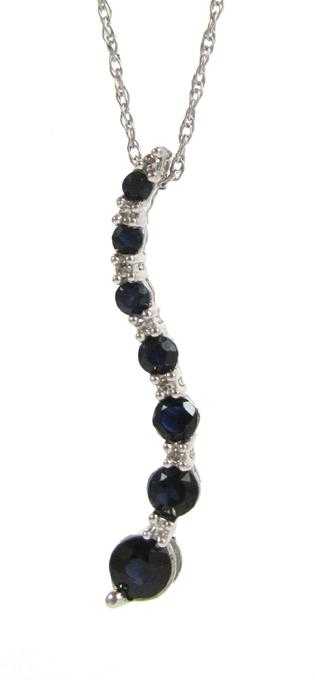 Appraisal: SAPPHIRE AND DIAMOND PENDANT NECKLACE suspended on an inch k