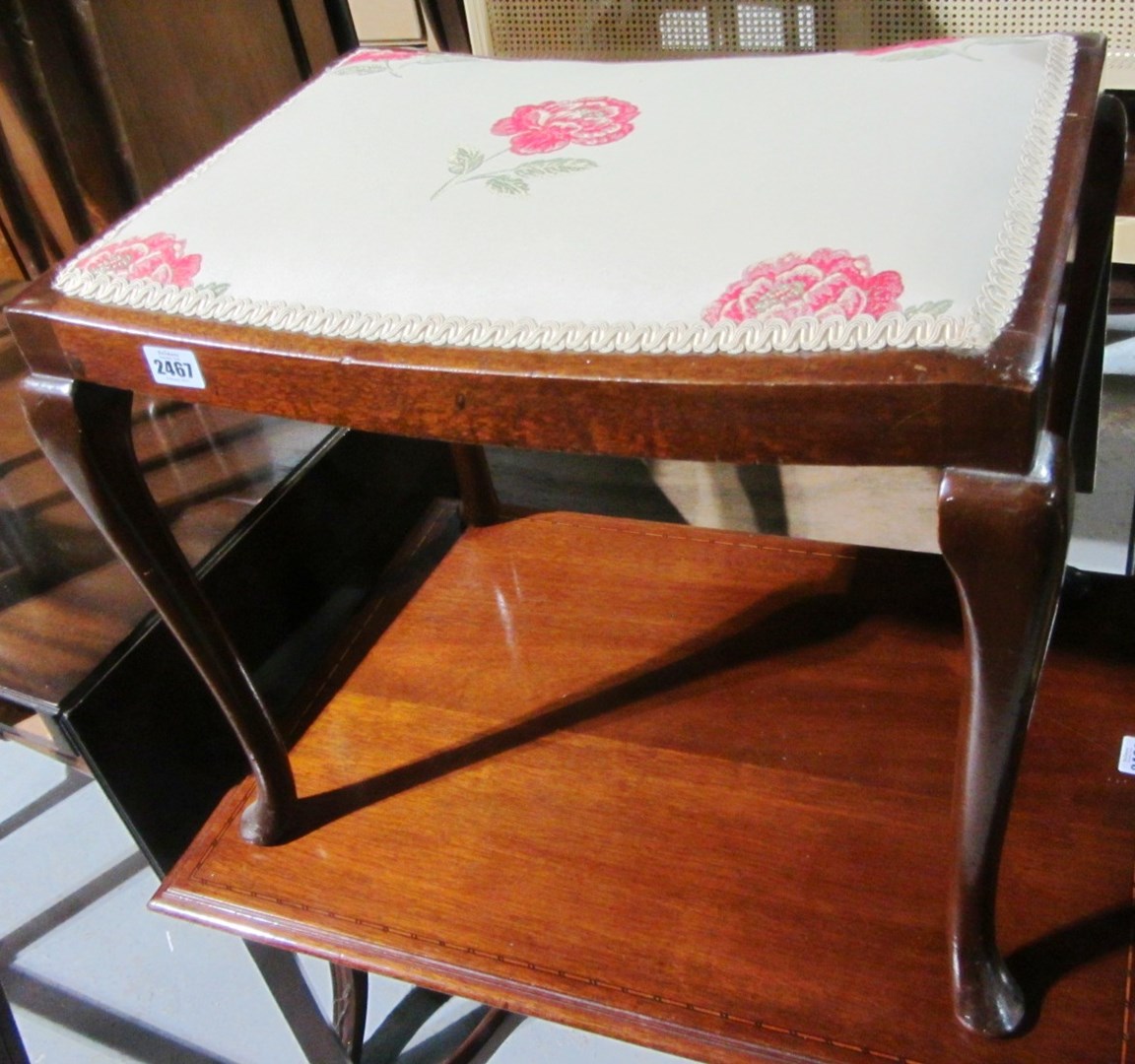 Appraisal: A mahogany footstool