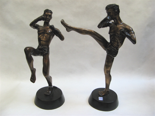 Appraisal: TWO BRONZE SCULPTURES OF PUGILISTS two fighters with fists raised