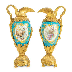 Appraisal: A Pair of Gilt Bronze Mounted Sevres Style Porcelain Ewers