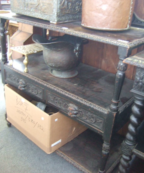 Appraisal: A th century stained oak buffet the ledge back with