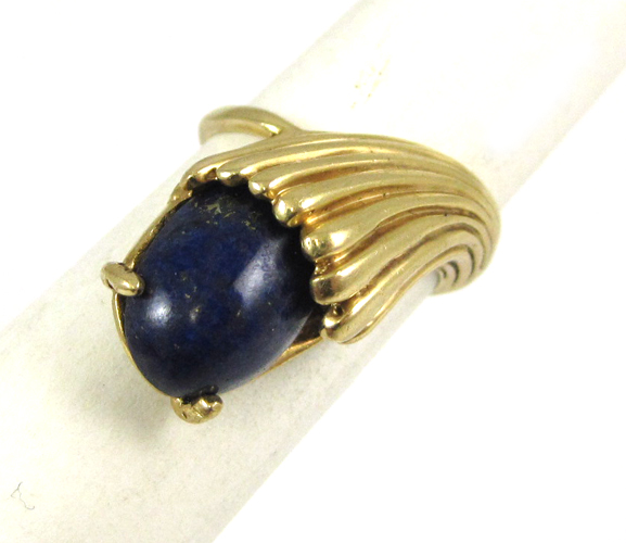 Appraisal: LAPIS LAZULI AND FOURTEEN KARAT GOLD RING set with a