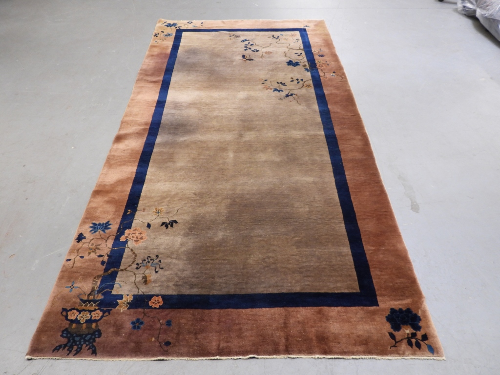 Appraisal: CHINESE ART DECO CARPET RUG ChineseArt Deco periodBrown central field