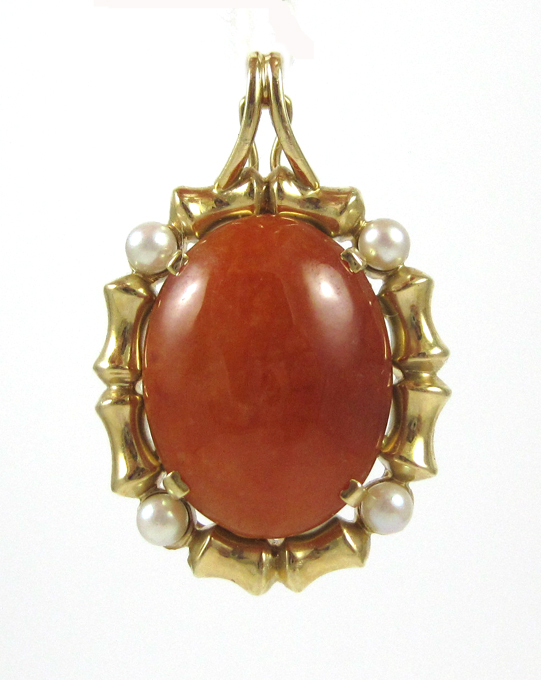 Appraisal: RED JADE AND FOURTEEN KARAT GOLD PENDANT with four round