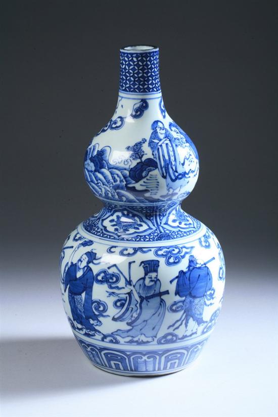 Appraisal: CHINESE BLUE AND WHITE DOUBLE GOURD VASE Painted to depict