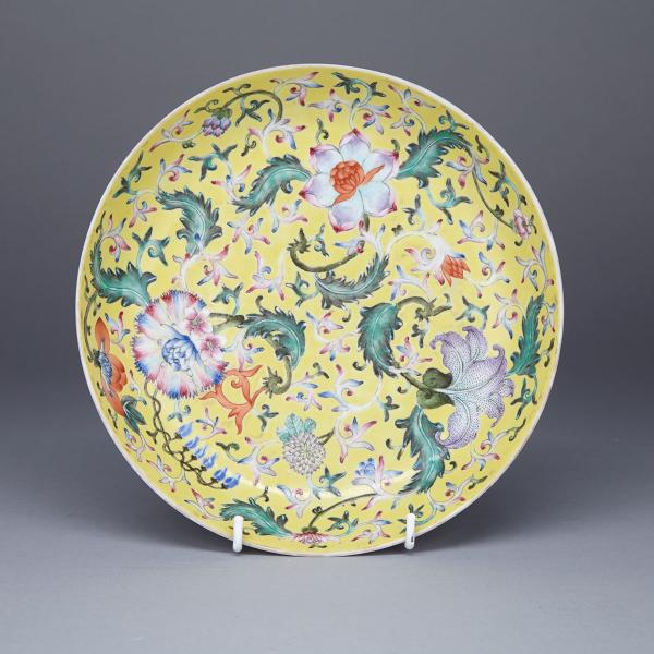 Appraisal: Famille Rose Yellow Ground Floral Dish Qianlong Mark Mid th-Century