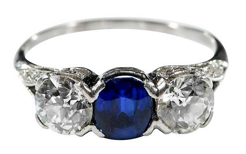 Appraisal: Platinum Kashmir Sapphire and Diamond Ring three stone ring center