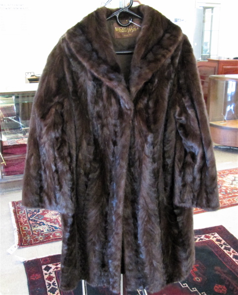 Appraisal: LADY'S MINK COAT brown fur with collar two exterior pockets