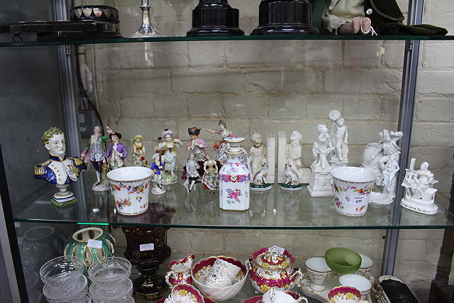 Appraisal: A COLLECTION OF ANTIQUE CONTINENTAL PORCELAIN FIGURINES and a Paris