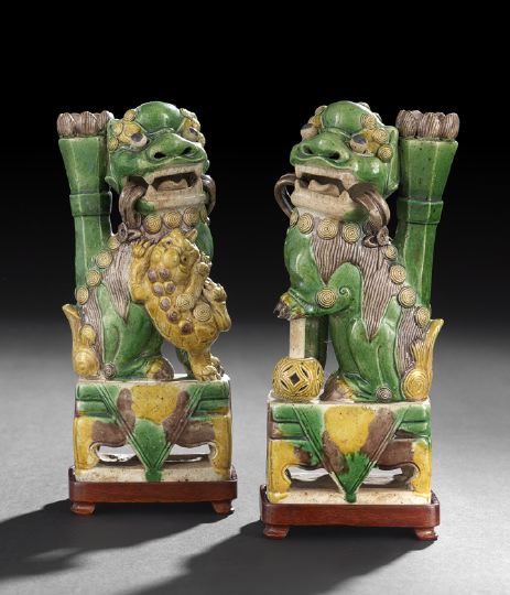 Appraisal: Pair of Chinese Glazed Pottery Foo Dog Incense Holders th