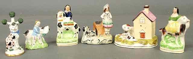 Appraisal: Five small th c Staffordshire figural groups- four of children