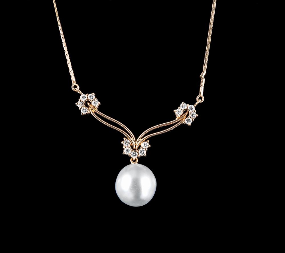 Appraisal: kt Yellow Gold Gray South Sea Pearl and Diamond Pendant