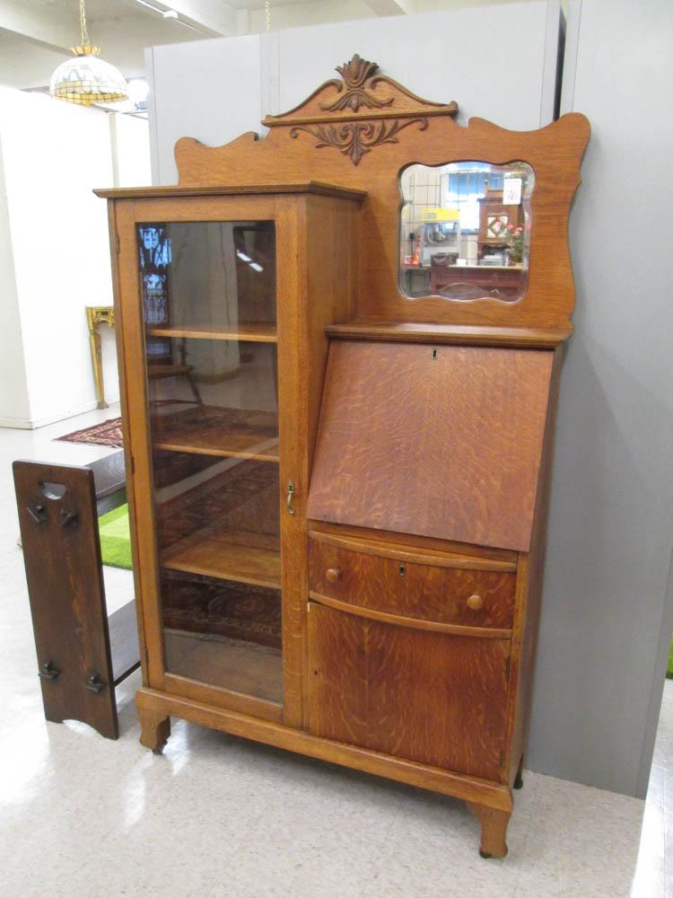 Appraisal: AN OAK SECRETARY BOOKCASE The Larkin Company Buffalo New York