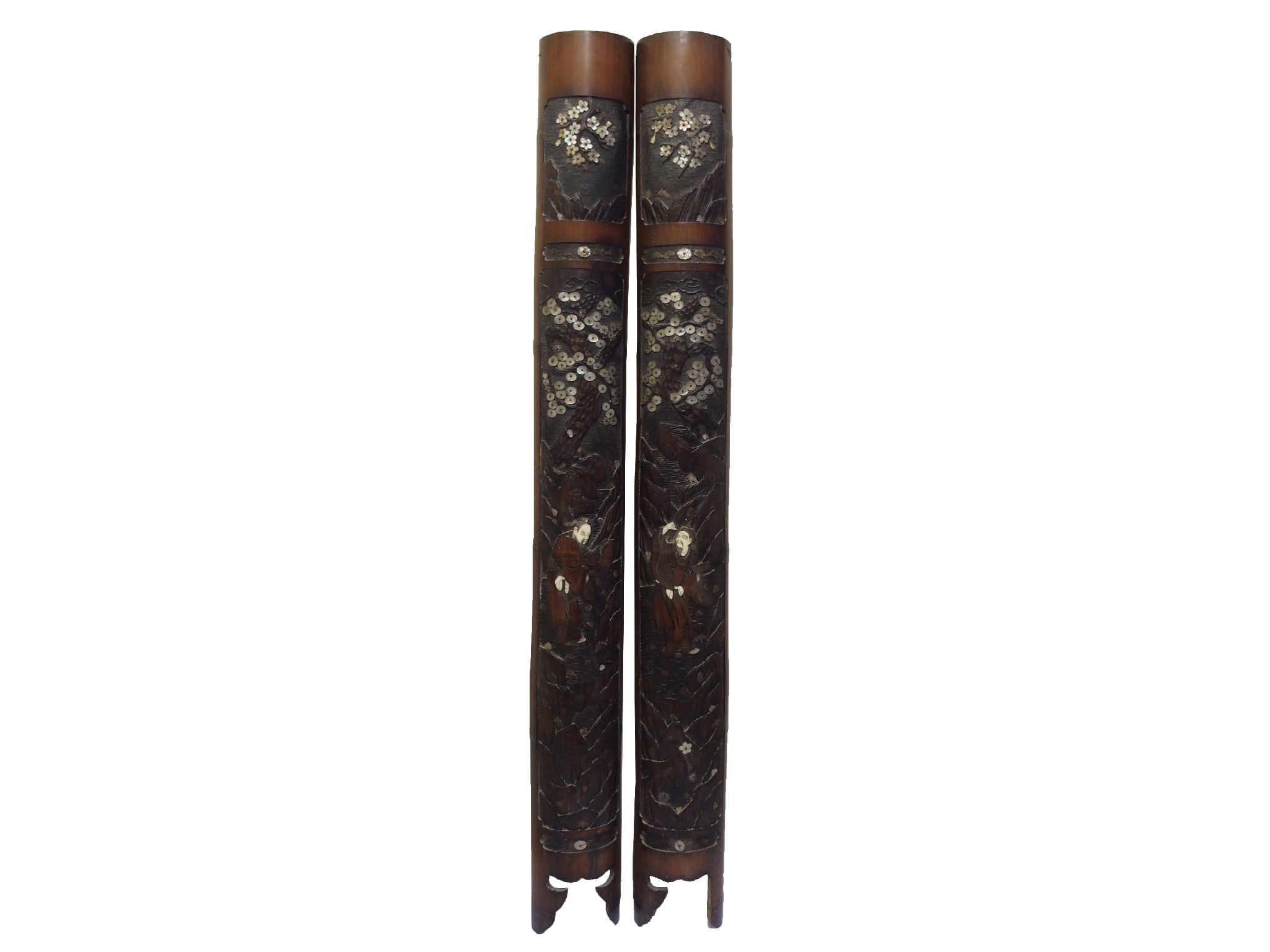 Appraisal: A pair of Japanese bamboo pole panelseach carved and applied