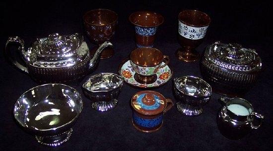 Appraisal: Two copper lustre goblets and other lustreware