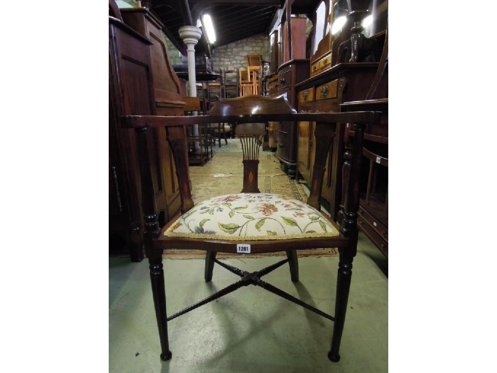 Appraisal: An inlaid Edwardian mahogany occasional chair with horseshoe shaped back