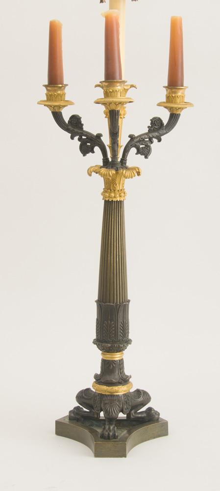 Appraisal: EMPIRE ORMOLU AND PATINATED BRONZE FOUR-LIGHT CANDELABRUM Now adapted as