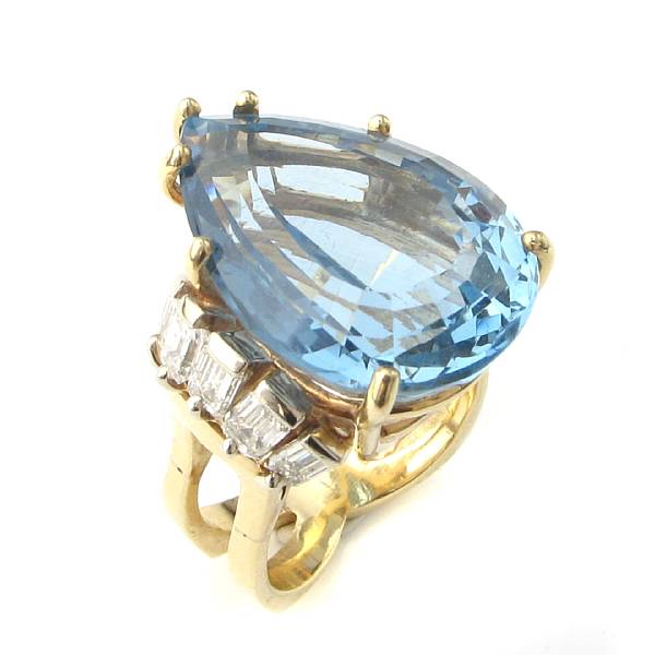 Appraisal: A topaz diamond and k gold ring a large pear