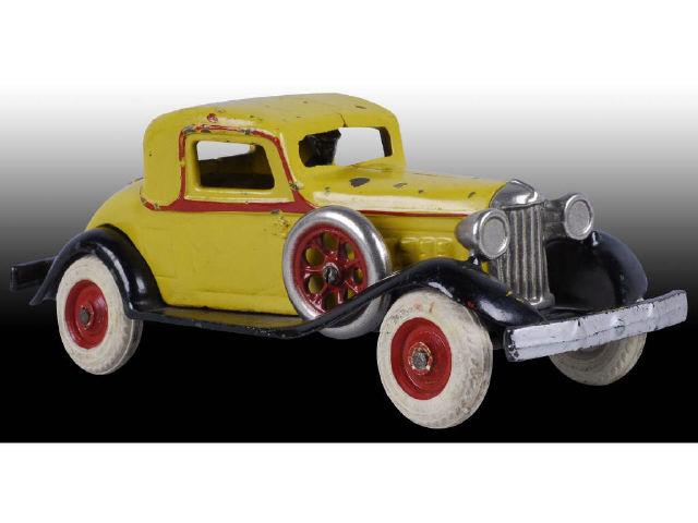 Appraisal: Cast Iron Arcade REO Coupe Toy Description Includes nickel-plated driver