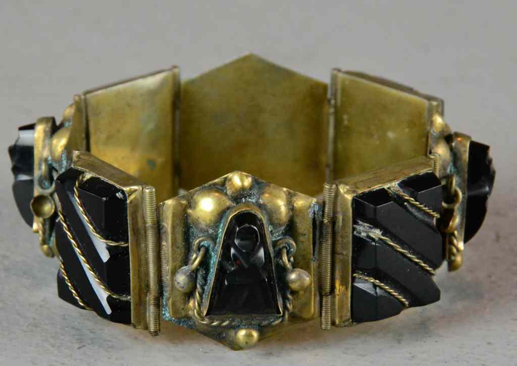 Appraisal: Sterling Silver and Carved Onyx BraceletConsisting of eight pieces of