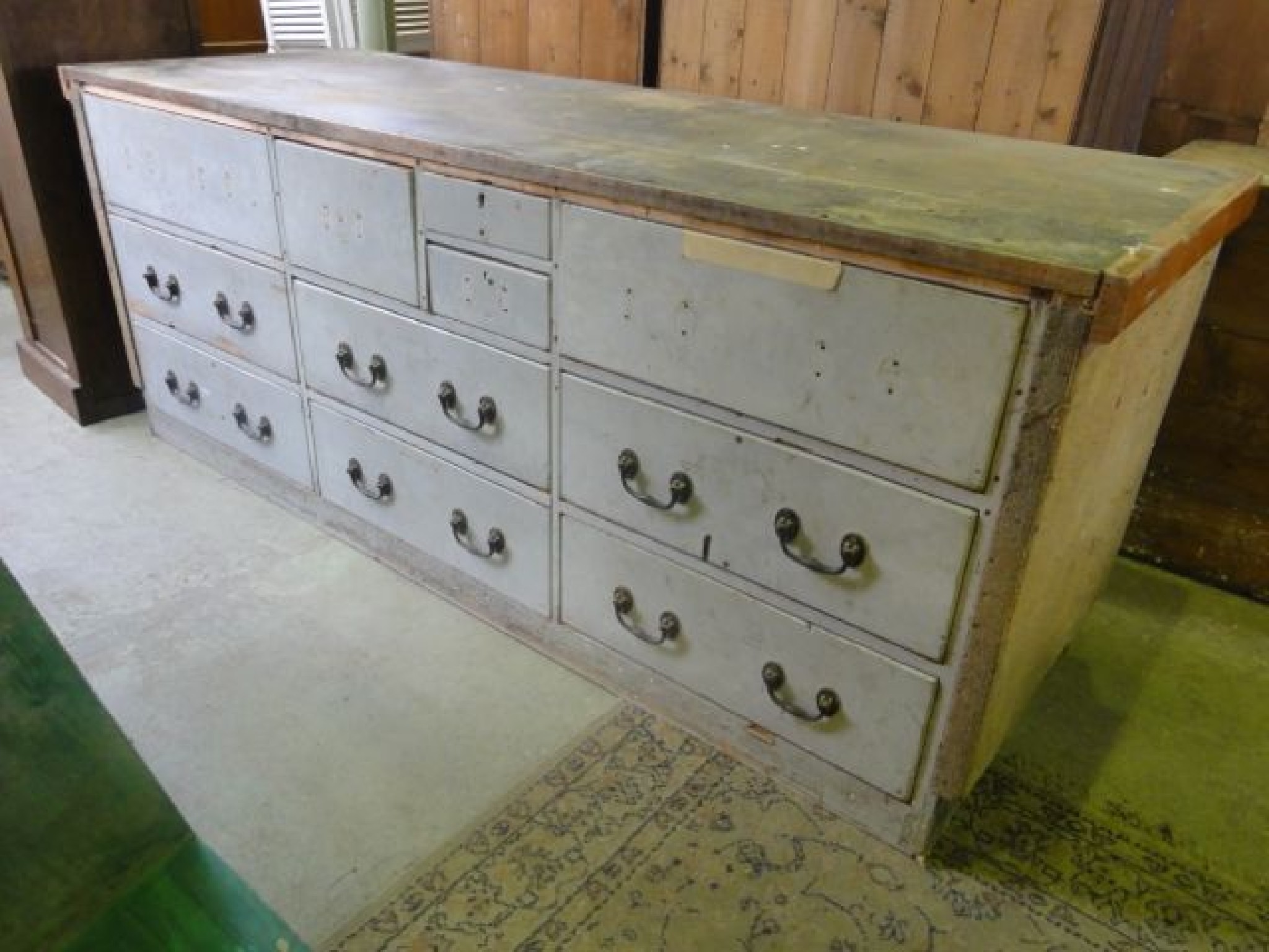 Appraisal: A substantial vintage painted pine framed shop counter with tapered