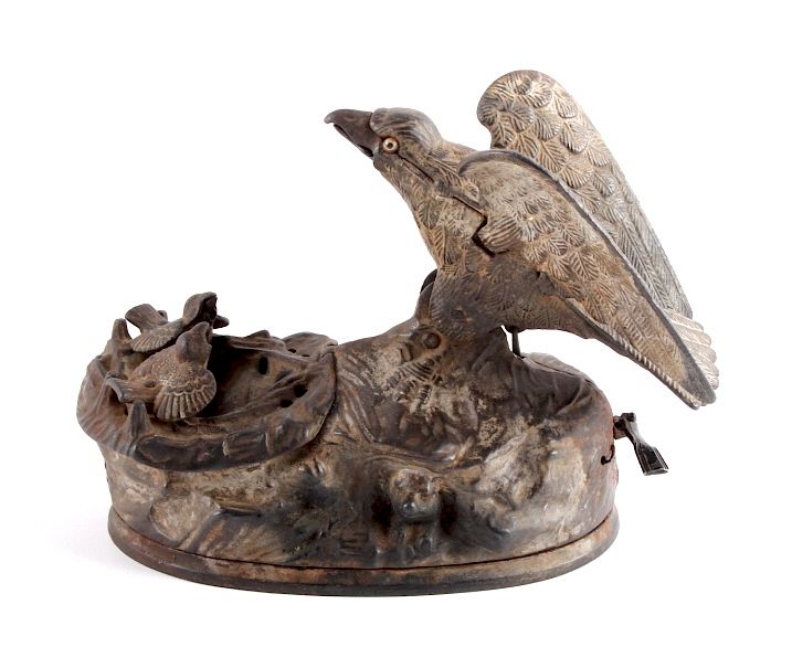 Appraisal: Antique J E Stevens Cast Iron Eagle Coin Bank This