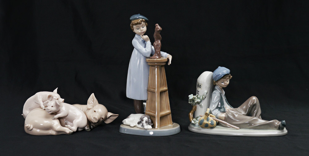 Appraisal: LLADRO PORCELAIN FIGURINES PLAYFUL PIGLETS Jose Roig sculptor issued retired