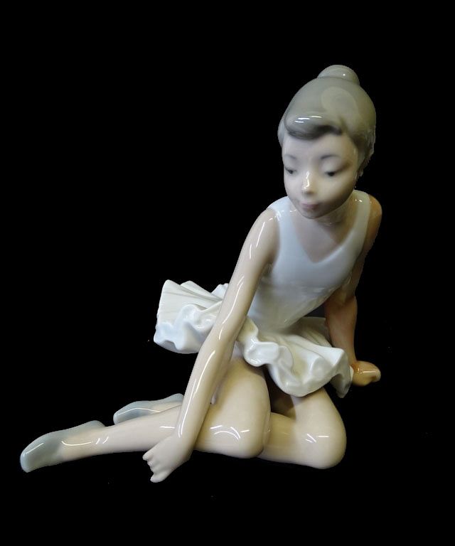 Appraisal: NAO by Lladro Seated Ballerina Porcelain NAO by Lladro Seated