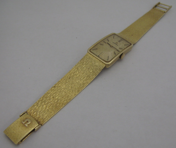 Appraisal: AN OMEGA GOLD BRACELET WRISTWATCH K yellow gold case and