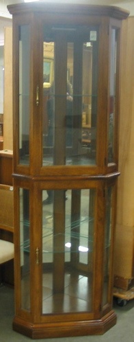 Appraisal: MODERN CORNER CURIO CABINET Pulaski Furniture Corp Pulaski Virginia manufactured