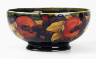 Appraisal: Moorcroft pomegranate pattern art pottery footed bowl x Moorcroft pomegranate