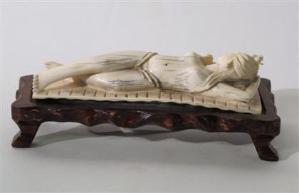 Appraisal: Chinese carved elephant ivory doctor's modelRecumbent female form over wood