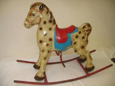 Appraisal: A Mobo rocking horse painted tin plate on tubular steel