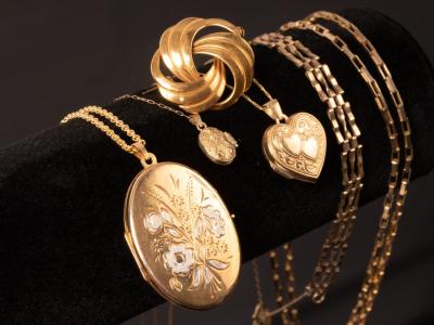 Appraisal: Three ct gold lockets on fine link ct gold chains