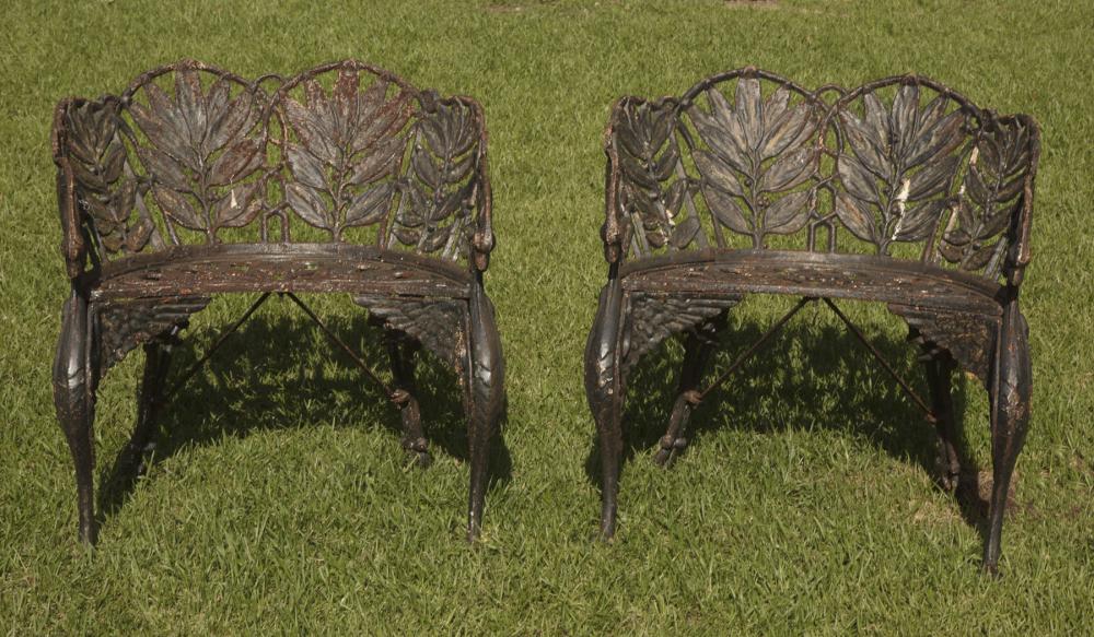 Appraisal: Pair of American Laurel Pattern Cast Iron Garden Chairs th