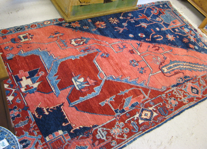 Appraisal: TURKISH TRIBAL AREA RUG hand knotted in a stylized floral