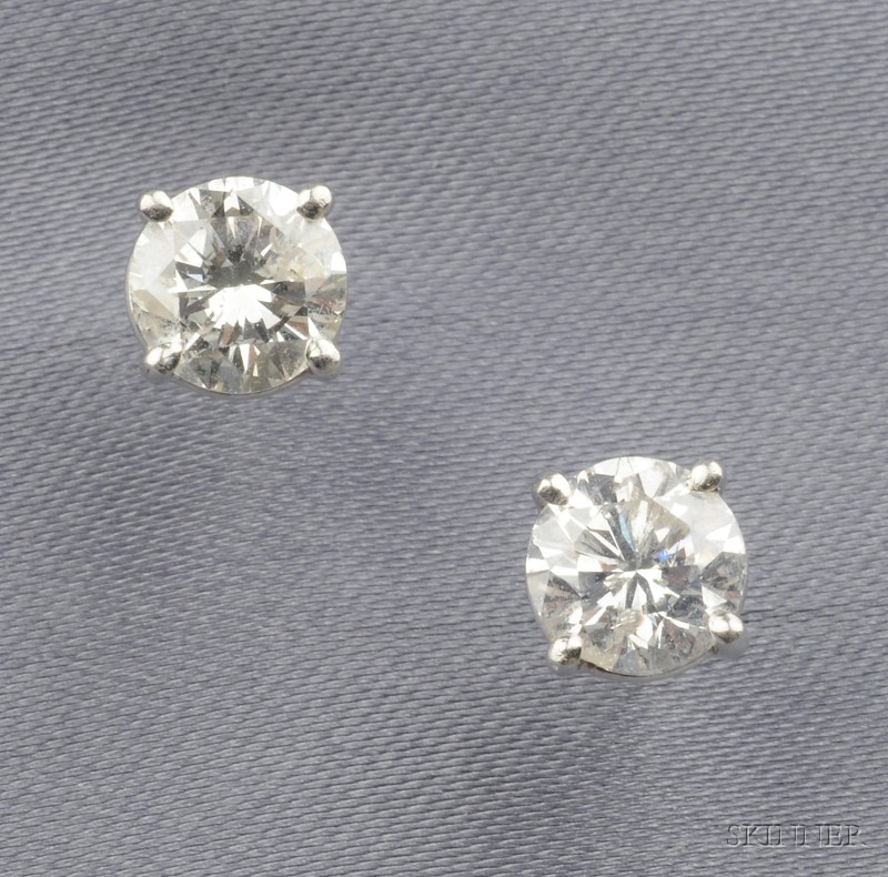 Appraisal: Platinum and Diamond Stud Earrings each prong-set with a round