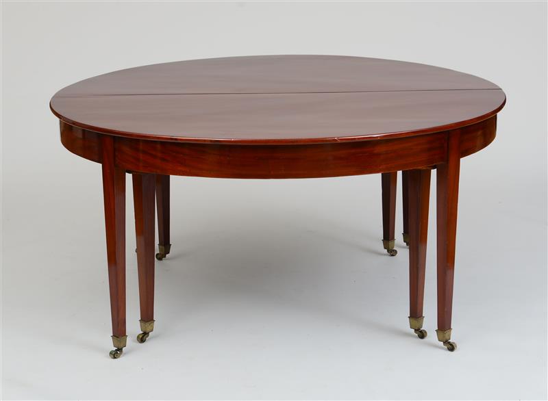 Appraisal: LOUIS XVI STYLE MAHOGANY EXTENSION DINING TABLE The circular divided